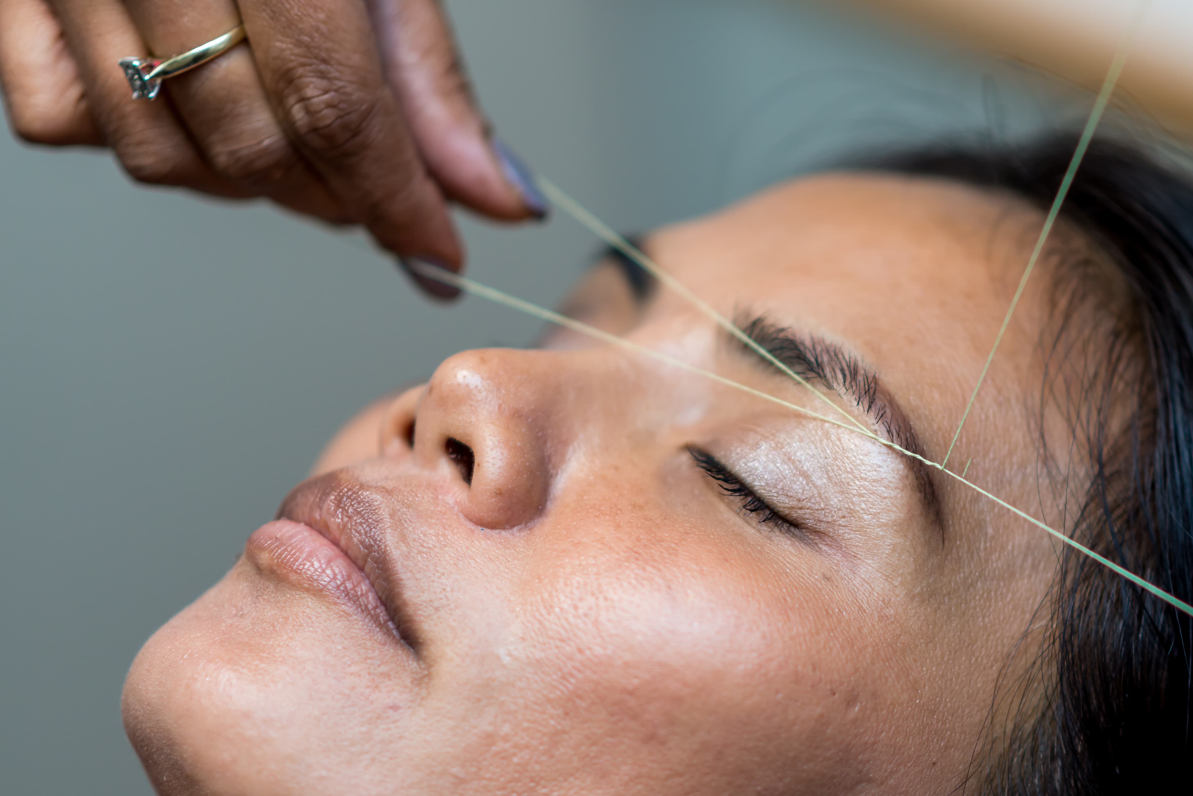 Eyebrow threading